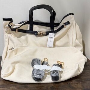 Elegant Cream and Black Satchel